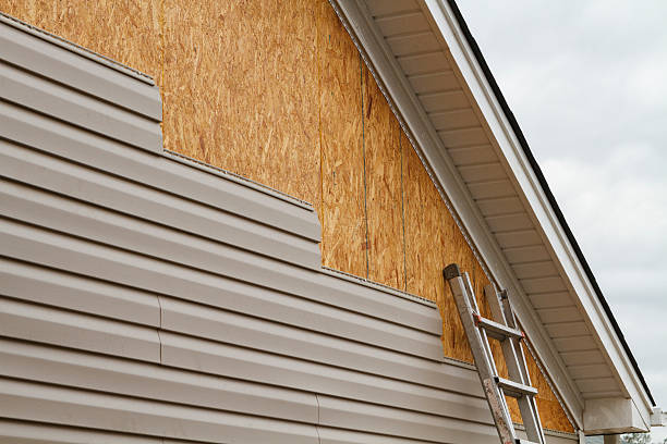 Professional Siding Repair technician working in Pine Lake, GA